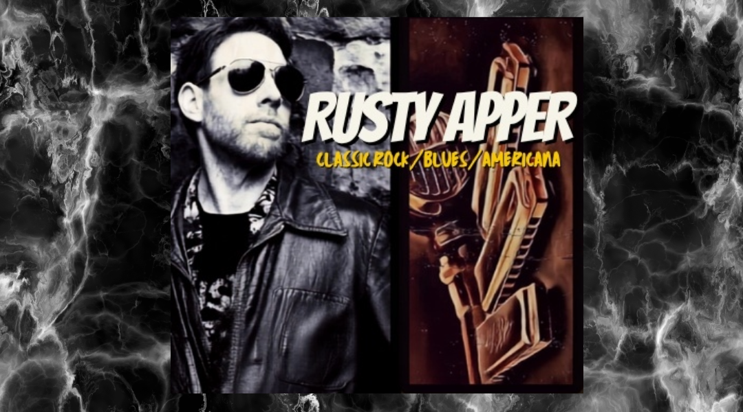 Image showing a picture of Rusty Apper with his name and Classical Rock Concert on a dark smokey background.