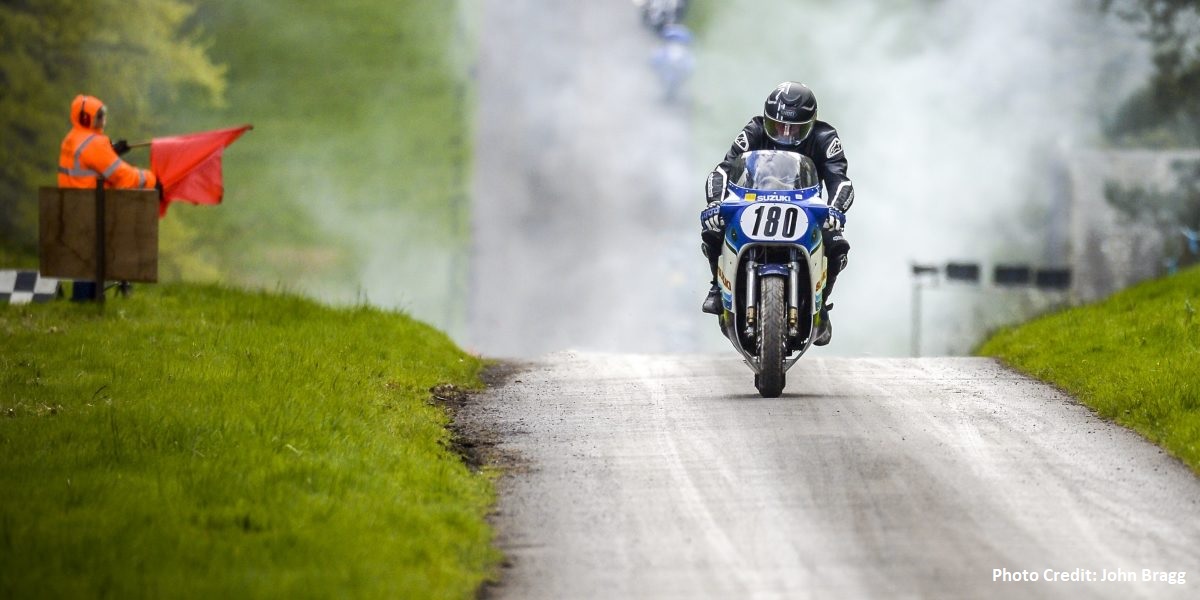 Motorcycle Sprint Motorcycle competitor with number 188 racing up the hill at Hoghton Tower for their annual motorcycle sprint race