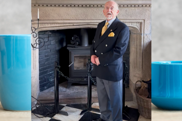 Banner displaying two teacups in the background with a picture of John Ball local historian at the front.