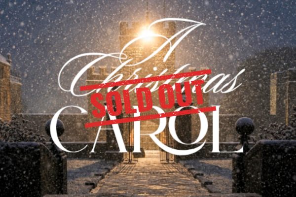 Picture of the Tower in the snow including A Christmas Carol title and sold out
